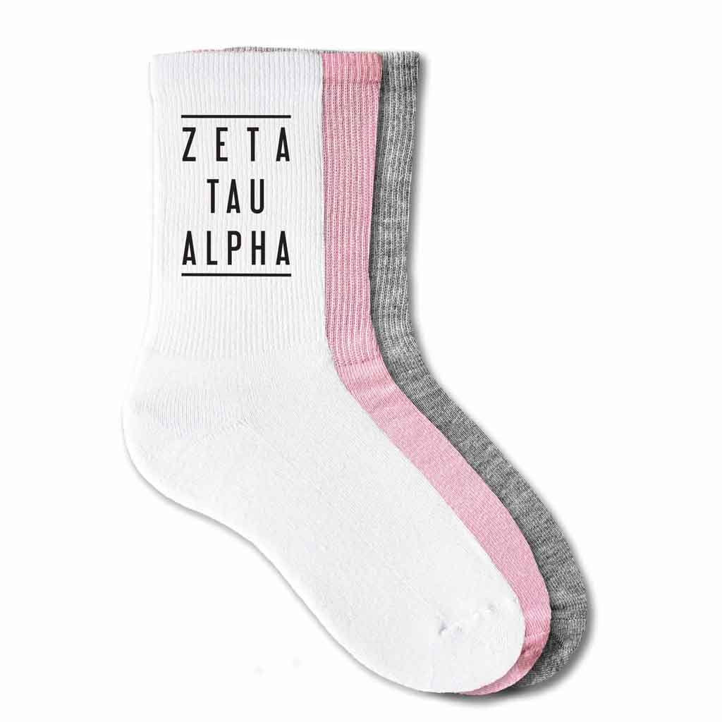 Zeta Tau Alpha sorority crew socks with sorority name printed on the socks