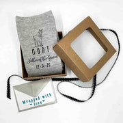 Fun personalized heather grey ribbed crew wedding socks for the GOAT father of the groom with a gift wrap bundle included with purchase of the wedding socks.