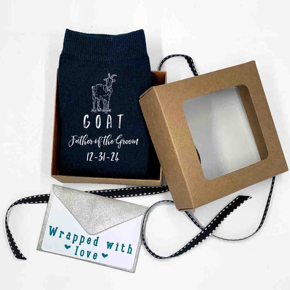 Fun personalized black flat knit wedding socks for the GOAT father of the groom with a gift wrap bundle included with purchase of the wedding socks.