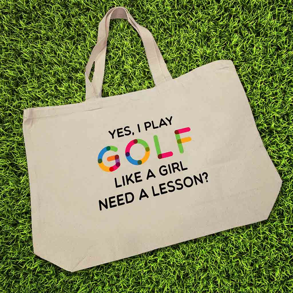 Canvas tote bag custom printed with golf saying to play like a girl.