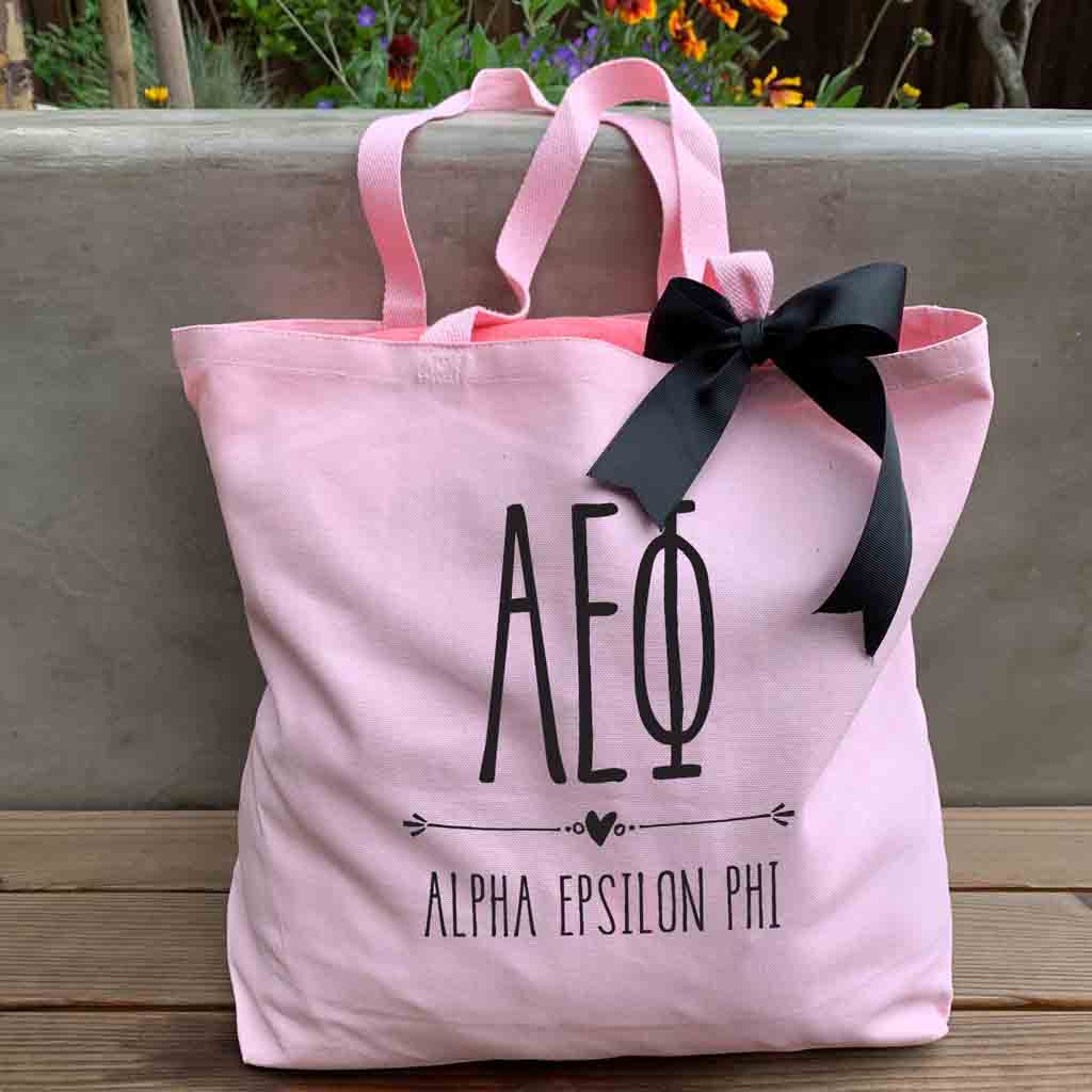 Alpha Epsilon Phi sorority name and letters custom printed on pink canvas tote bag with black bow