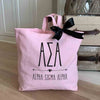 ASA sorority name and letters custom printed on pink canvas tote bag with black bow 