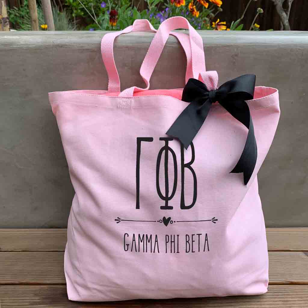 Gamma Phi Beta sorority letters and name custom printed on pink canvas tote bag with black bow
