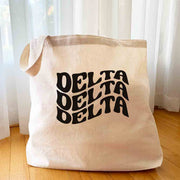 Delta Delta Delta digitally printed simple mod design on roomy canvas sorority tote bag.
