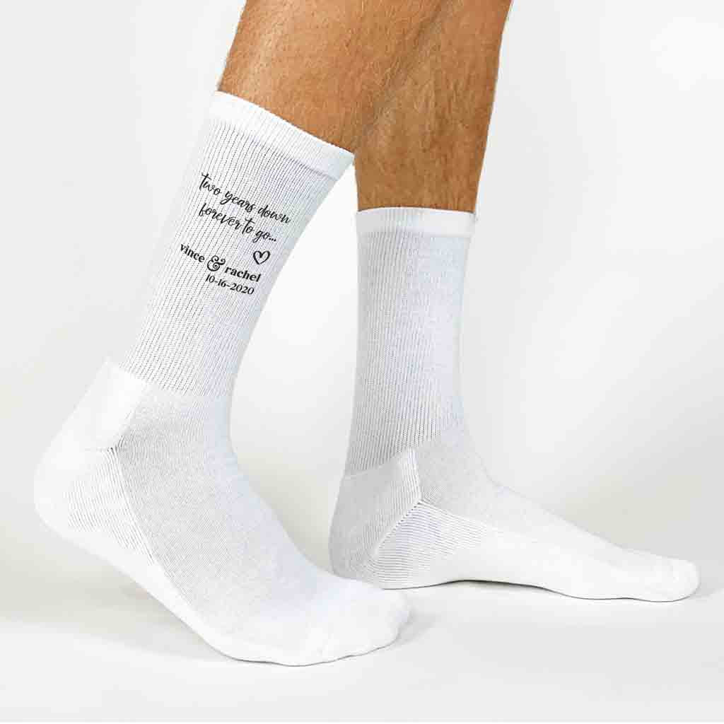 Custom printed two year anniversary socks digitally printed with two years down forever to go a heart design and personalized with your names and date.