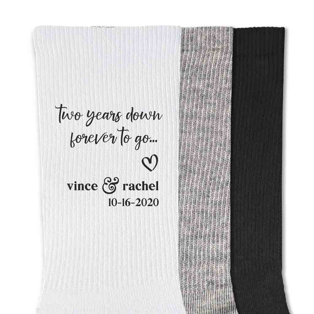 Custom printed two year anniversary socks digitally printed with two years down forever to go a heart design and personalized with your names and date.