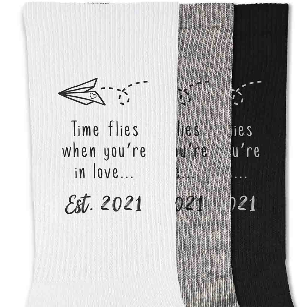 Time flies when you're in love digitally printed on socks and personalized with your established wedding year.