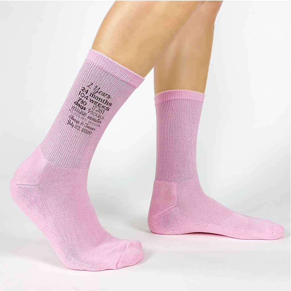 Pink 2 year anniversary socks personalized with a wedding date