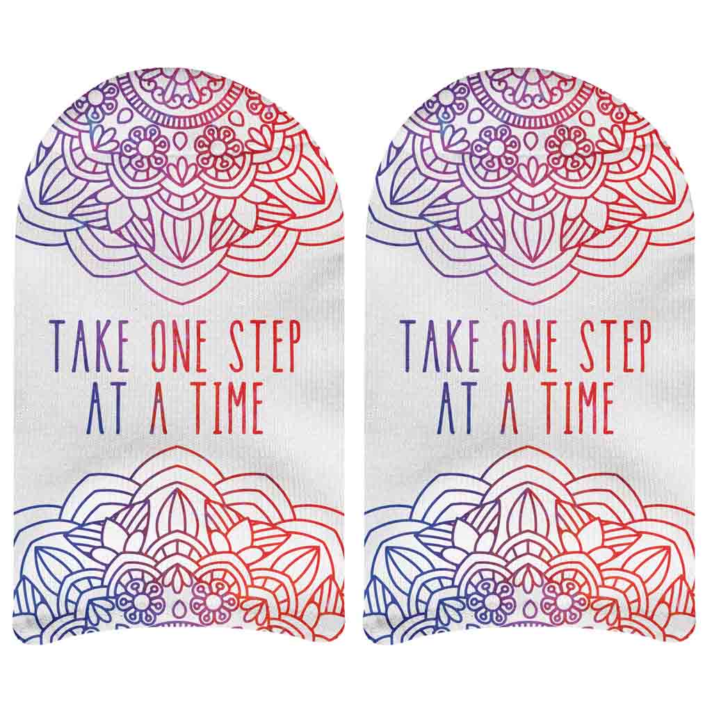 Take one step at a time mandola design style digitally printed on white no show socks with classic or gripper sole.