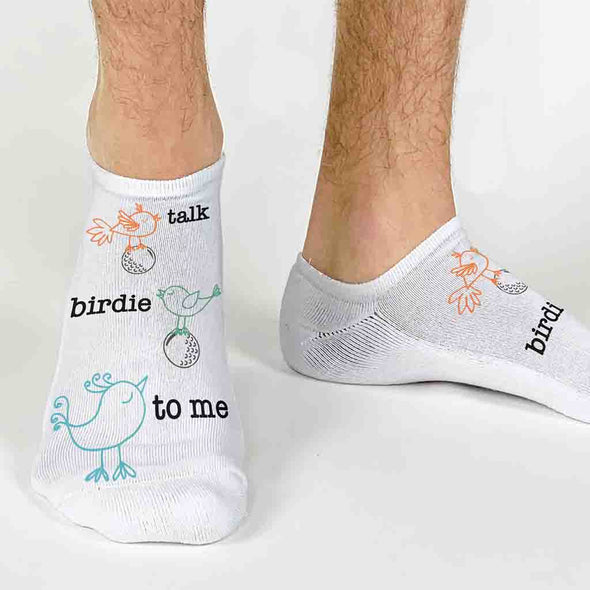 Talk birdie to me design custom printed on the top of the white cotton blend no show socks are the perfect novelty golf socks.