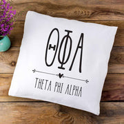 Theta Phi Alpha sorority letters and name in boho style design custom printed on white or natural cotton throw pillow cover.