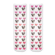 Custom pet photo socks personalized with your dogs face printed all over the cotton crew socks with pink hearts background makes a cute gift for your daughter.