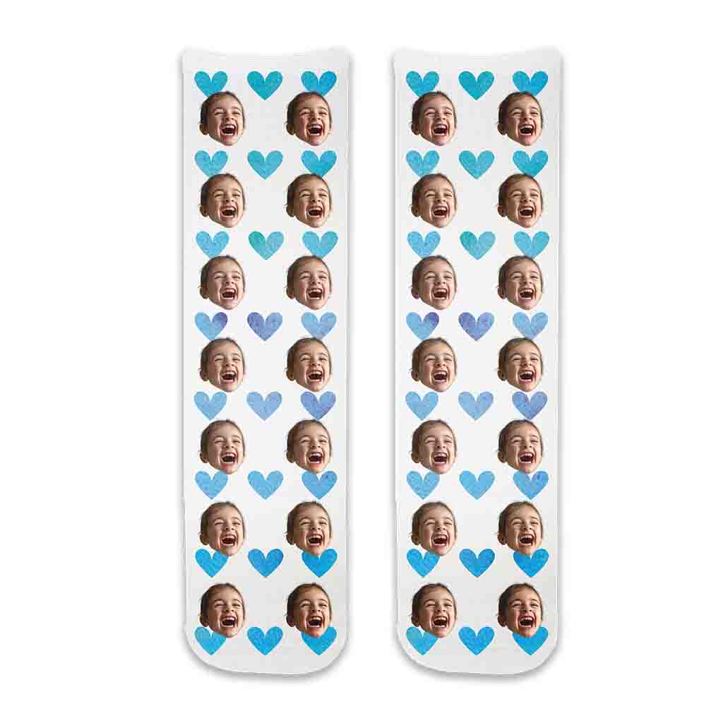 Photo face socks personalized using your photos custom printed on cotton crew socks with blue hearts background is a fun idea for a baby shower favor or new parents!