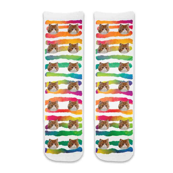 Custom printed photo face socks using your photos we digitally print on cotton crew socks with the striped rainbow wash background makes a fun party favor at your pets birthday party.