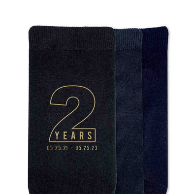 Personalized two year anniversary socks for your spouse with gold ink.