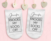 Knocks my socks off custom printed and personalized with your name digitally printed on the top of white cotton no show socks.
