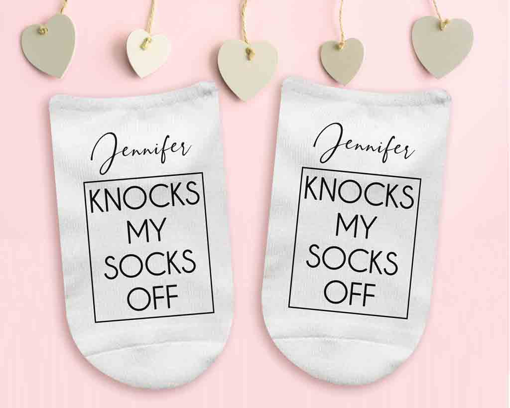 Knocks my socks off custom printed and personalized with your name digitally printed on the top of white cotton no show socks.