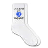Life is better with volleyball and a ball and number design custom printed on white cotton crew socks.