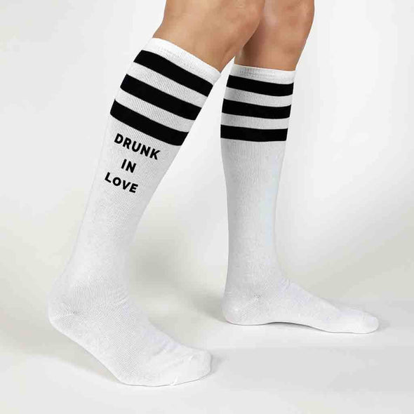 Custom digitally printed with Drunk in Love and Just Drunk knee high white socks with black stripes