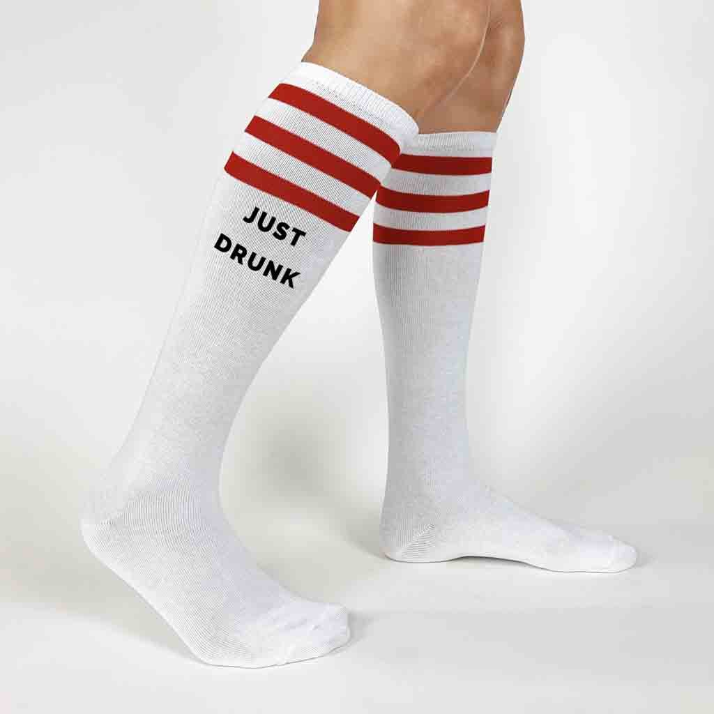 Custom bachelorette party knee high socks with red stripes digitally printed with drunk in love and just drunk 