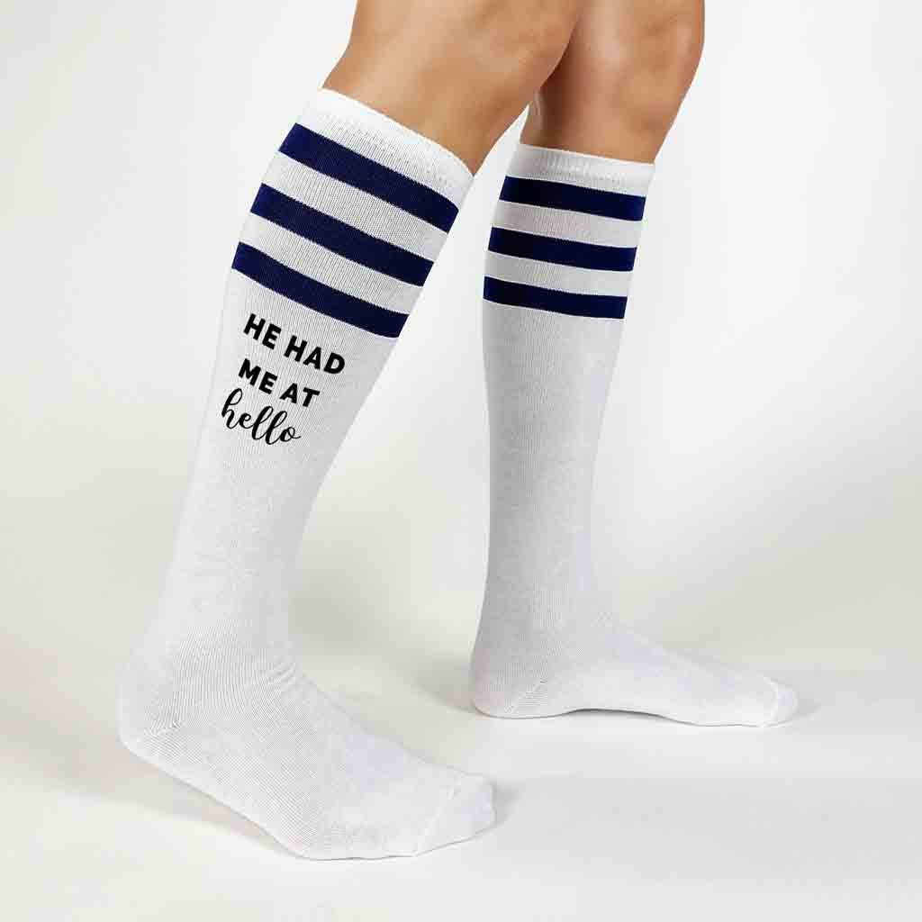 Custom bachelorette party white knee high socks with navy blue stripes digitally printed with he had me at hello and you had me at merlot 