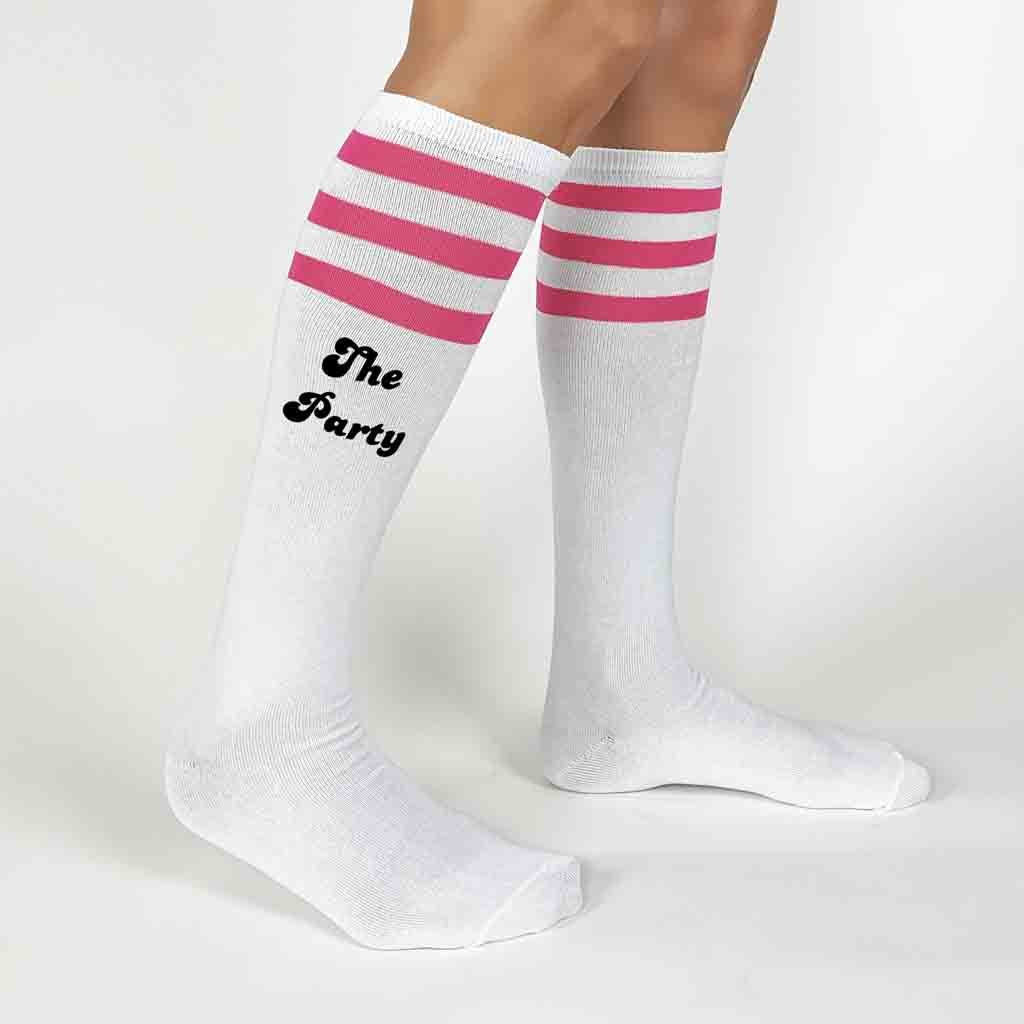 Fun cotton white knee high socks with pink stripes custom printed for your bachelorette party with wife of the party and the party