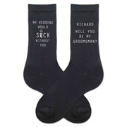 Groomsmen proposal printed on black dress socks personalized with a name and slogan