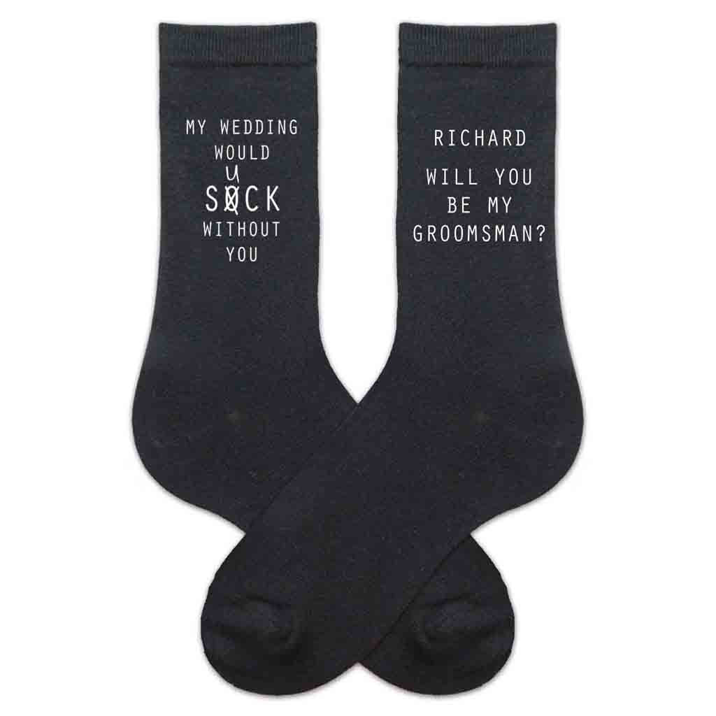 Groomsmen proposal printed on black dress socks personalized with a name and slogan