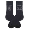 Groomsmen proposal printed on black dress socks personalized with a name and slogan