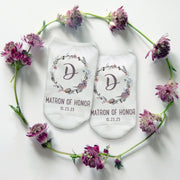 Unique pair of socks digitally printed with floral design, monogram, wedding role and date on no show socks for the bridal party.
