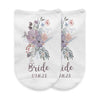 Bridal party personalized no show socks with a floral design personalized with your name and date.