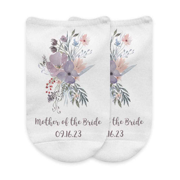 Super cute bridal party socks digitally printed with a floral design and personalized with your wedding role and date.