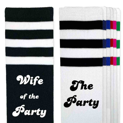 Knee high socks for the bachelorette party with wife of the party and the party on the side of the striped socks.