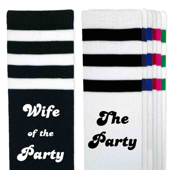 Knee high socks for the bachelorette party with wife of the party and the party on the side of the striped socks.