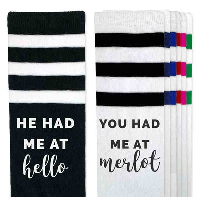 Custom printed striped knee high socks with you had me at hello and you had me at merlot on the sides of the striped knee high socks.