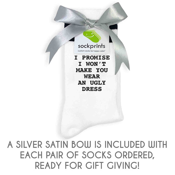 Bridesmaid proposal socks personalized with brides name.