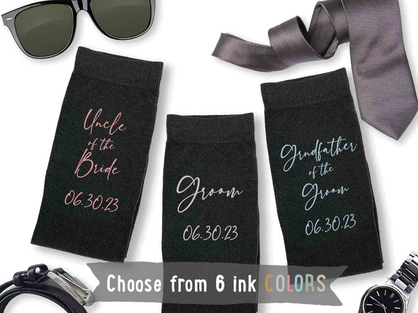 Custom printed socks for the wedding party with script writing with colored ink and wedding date.