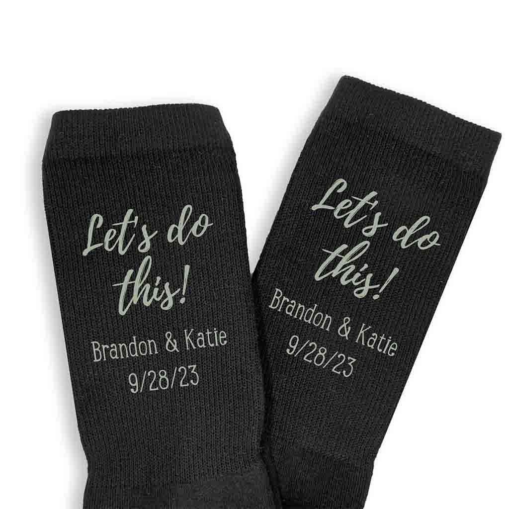 Let's Do This digitally printed on the side of the socks personalized with your wedding date and names for the groom on his wedding day.