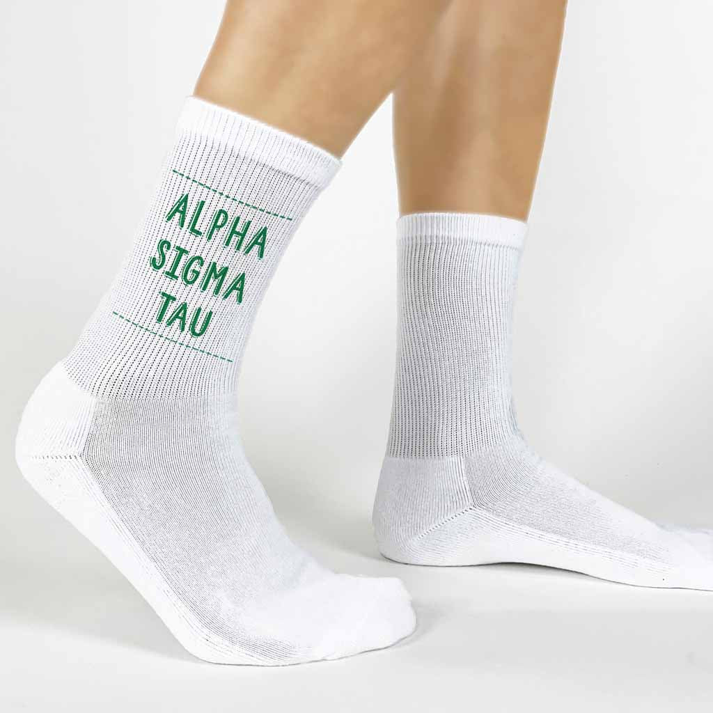 Highlight your Alpha Sigma Tau pride with a pair of these Alpha Sigma Tau crew socks printed in sorority colors. 
