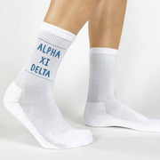 Highlight your Alpha Xi Delta pride with a pair of these Alpha Xi Delta crew socks printed in sorority colors. 