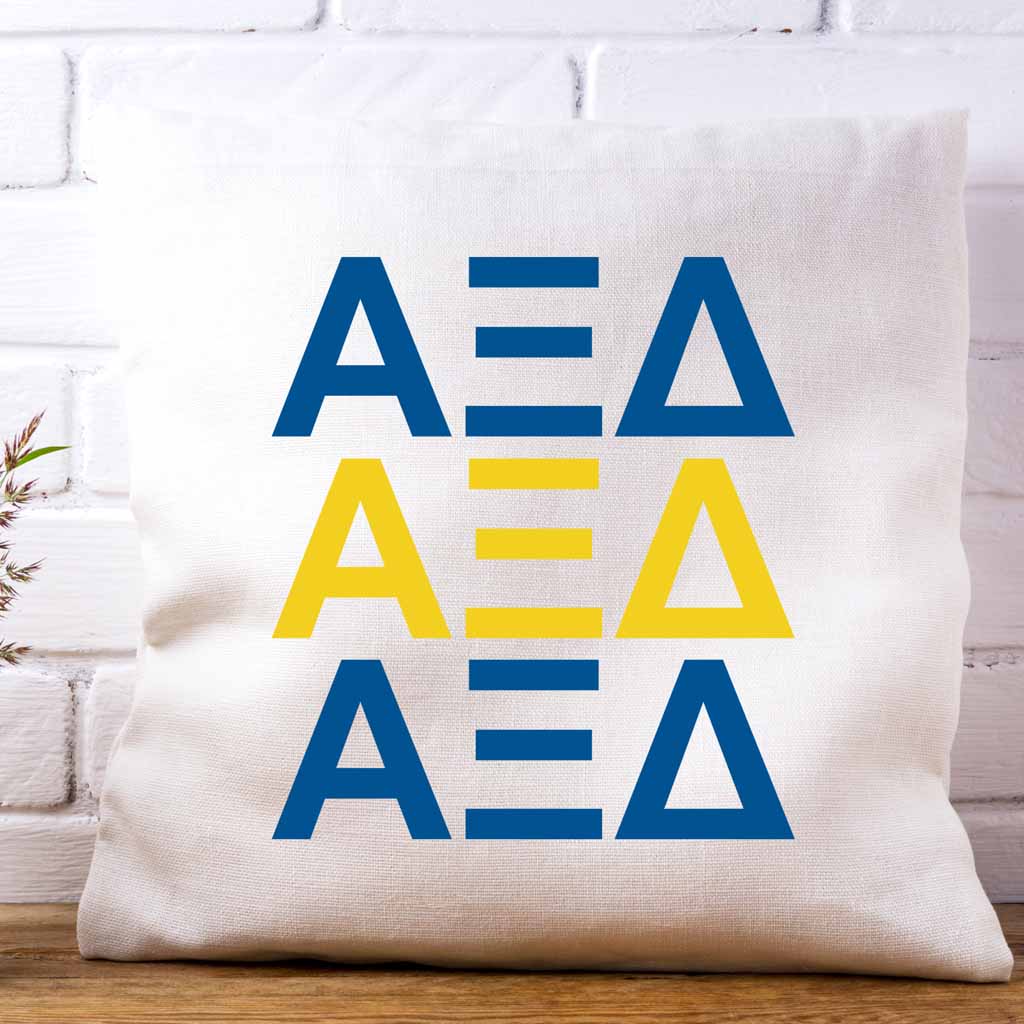 Alpha Xi Delta sorority letters digitally printed in sorority colors on throw pillow cover.