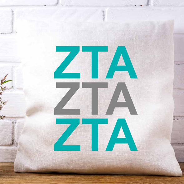 ZTA sorority letters in sorority colors printed on throw pillow cover is a stylish gift.