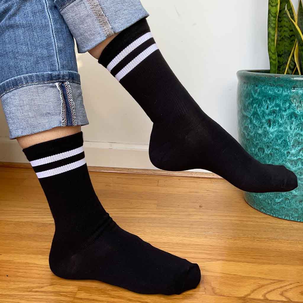 Basic black striped crew socks with white stripes are truly comfortable.