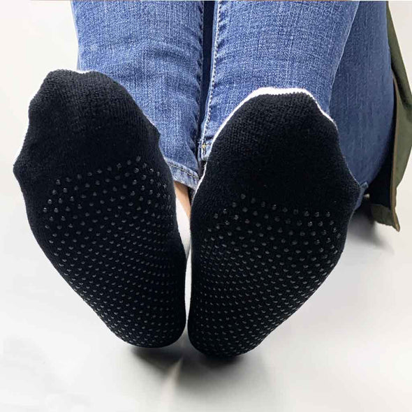 We custom print your design on the top white area of the no show gripper socks with anti skid silicone dots on the bottom soles of the foot.