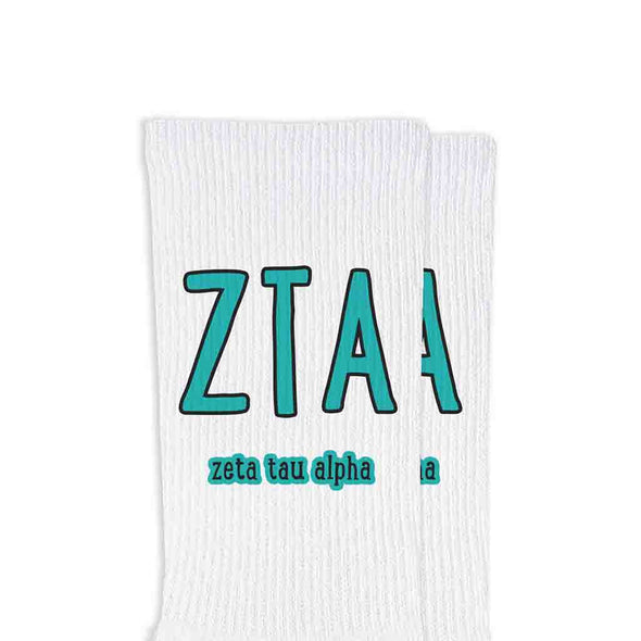 Zeta Tau Alpha sorority letters and name digitally printed in sorority colors on white crew socks.