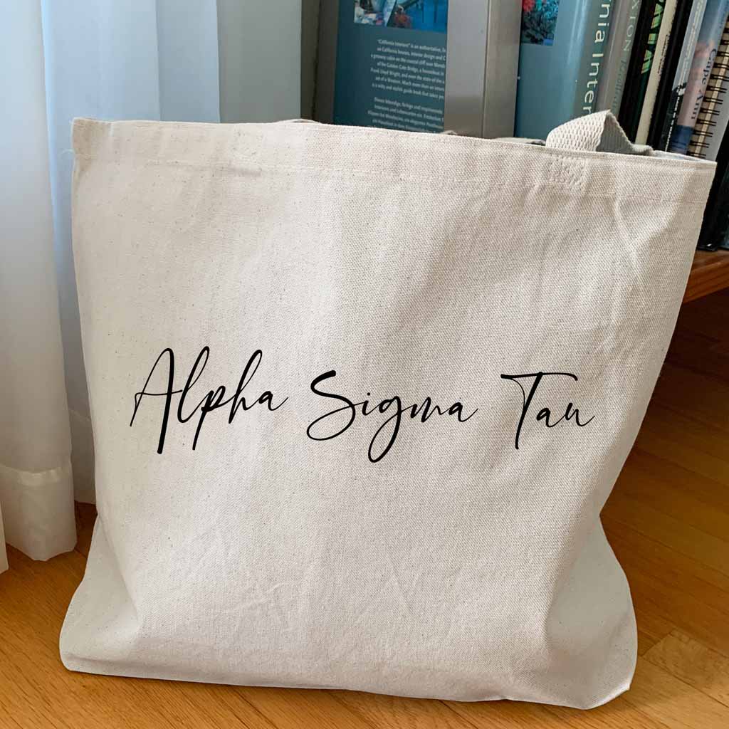 Alpha Sigma Tau sorority nickname custom printed in script writing on canvas tote bag is a unique gift for all your sorority sisters.