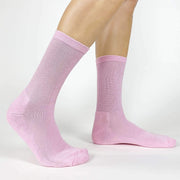 Create your own design or text on custom pink crew socks.