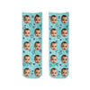 Add your photo to this custom photo sock with heart design and teal background