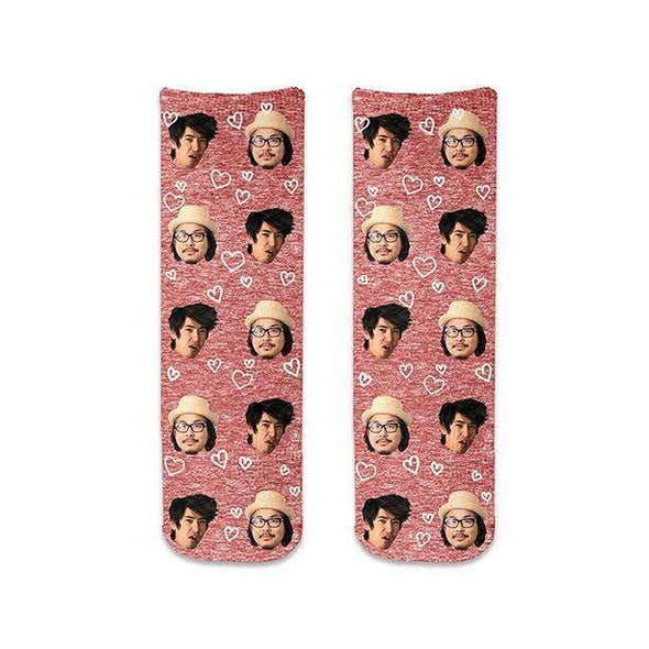 Add your photo to this custom printed unisex adult crew socks with the all over faces and heart design and red granular background is the perfect gift for the holiday season.