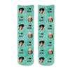 Cute custom printed unisex adult crew socks personalized using your own photo face cropped into the design and printed on teal speckle background.